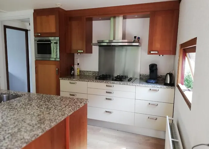 Roodborstje 4 Persoonschalet شاليه بوتِنْ